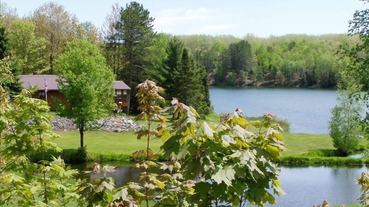 Upper Peninsula Michigan House | The Good Old Summertime - blue skies, green grass, and lovely water. Come enjoy!