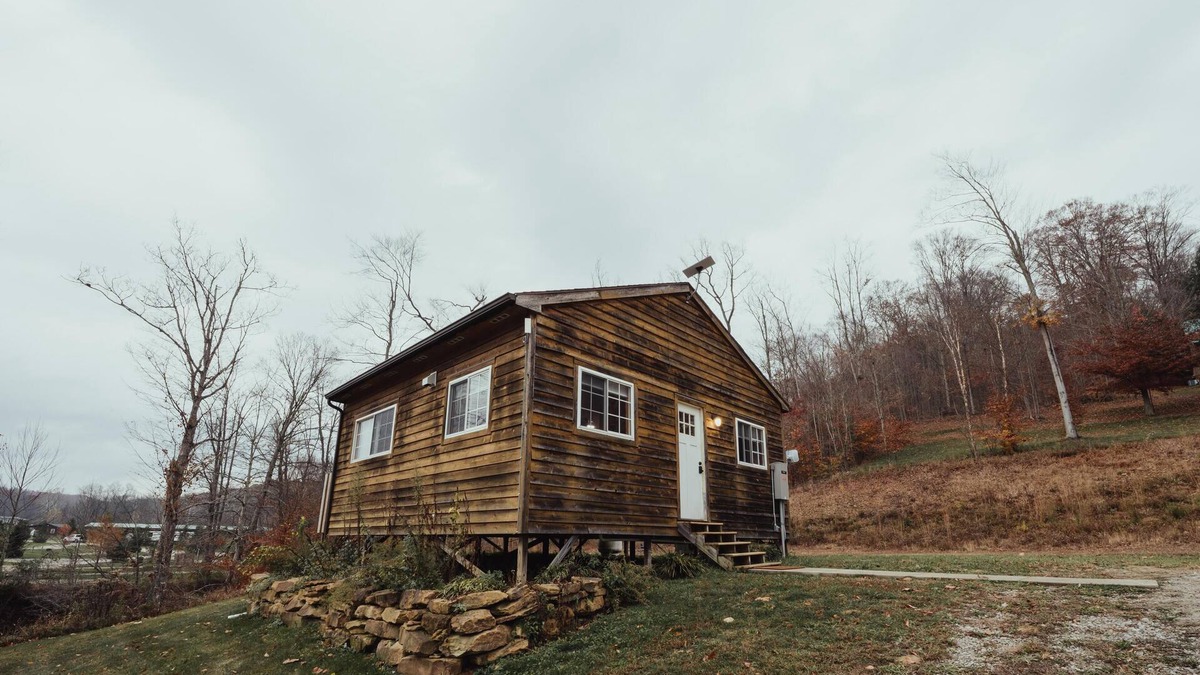 South Bloomingville Cabin | The Hideout - Escape to The Hideout in Hocking Hills, OH! This cozy, pet-friendly cabin offers a private deck by Pine Creek, just minutes from hiking, waterfalls, and caves. Perfect for up to 4 guests. Book your nature-filled getaway today!