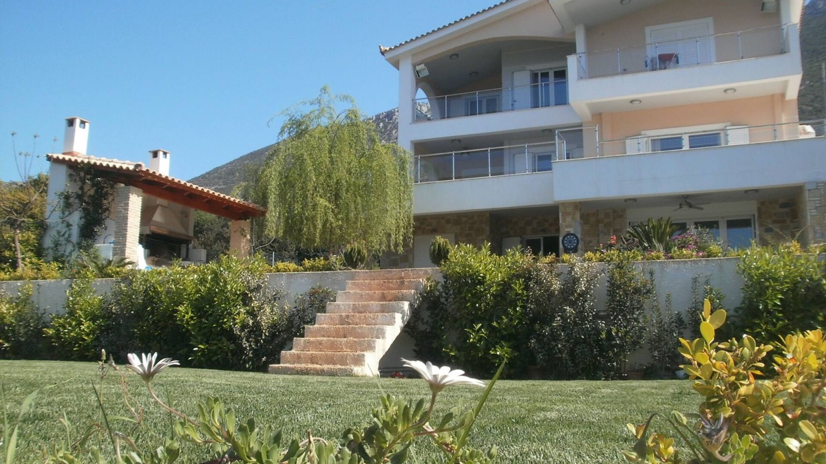 Skroponeria Apartment | The house is situated on the beach and it is only 1 minute walk .