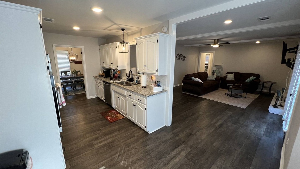 Fort Smith House | The Lily Pad. 3 bd/1ba. 4 beds. Center of town! Fenced backyard!