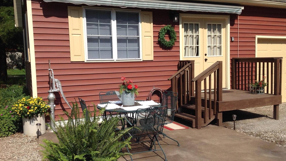 Marshall House | The Little Red Cottage is situated in a quaint country neighborhood
