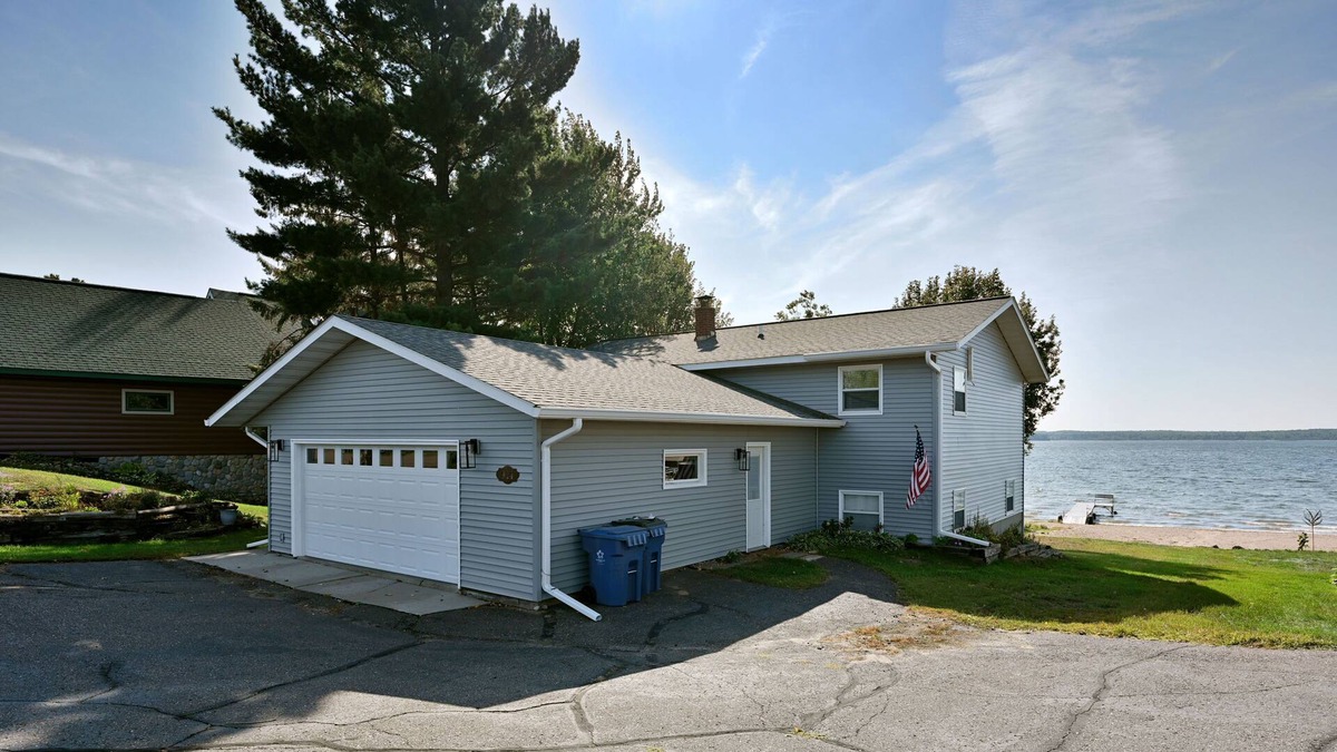 Shell Lake House | The Lively Loon- Exceptional sandy beach located minutes from Shell Lake.