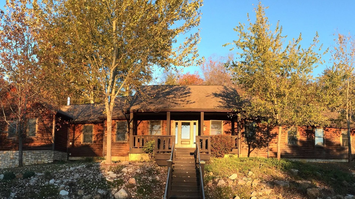 Logan Cabin | The Lodge at Harvest Moon sleeps 16 with five bedrooms and unique private Pub