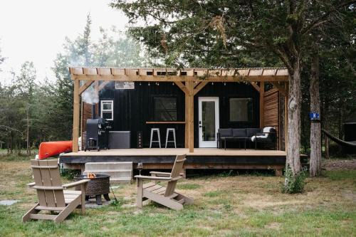 Tyendinaga Mohawk Territory Resort | The Loft - Stargazing Tiny Home with Firepit, Wood Fired Pizza Oven & Movie Projector