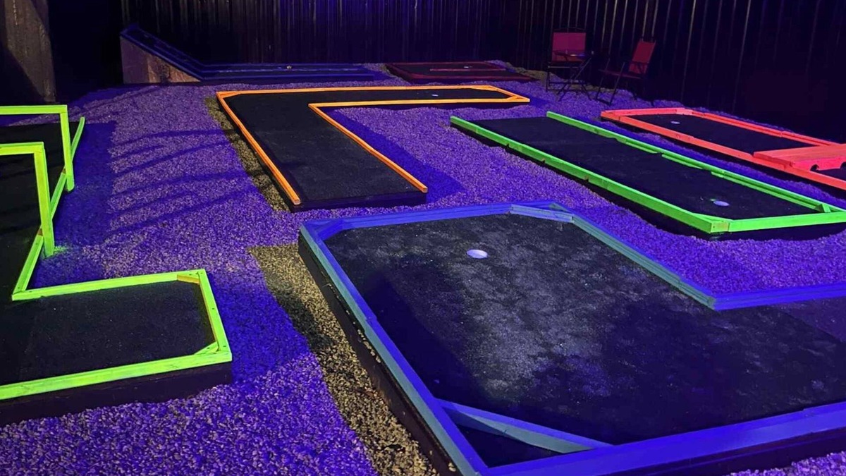 Columbus House | The Mini Golf Oasis king beds & Movie/Game room minutes to Fort Benning GA.