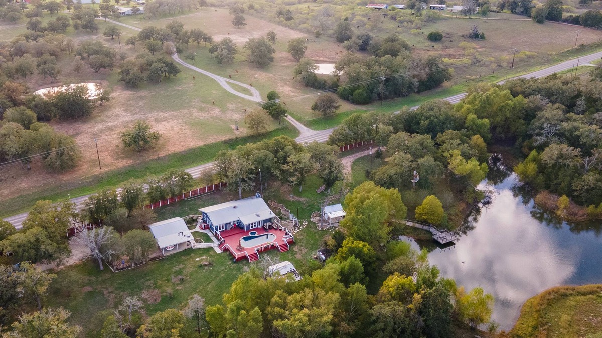 Prairie Lea House | The Outdoor Oasis Pool with No Heat/Fire Pit/Ponds
