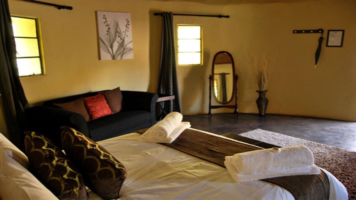 Hlotse House | The Queen-Size-Bed Riverside Huts