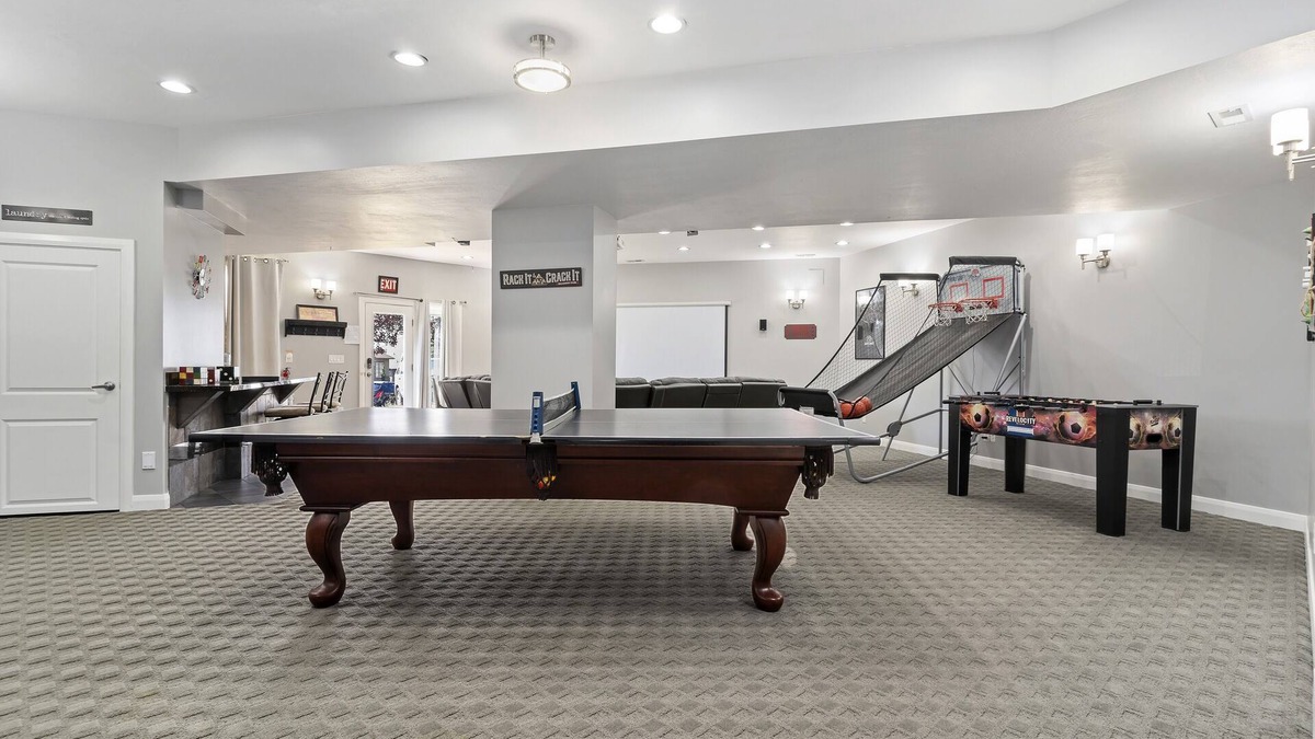 North Ogden Apartment | The Rec Room is a basement apartment with game tables, theater, hot tub & more!