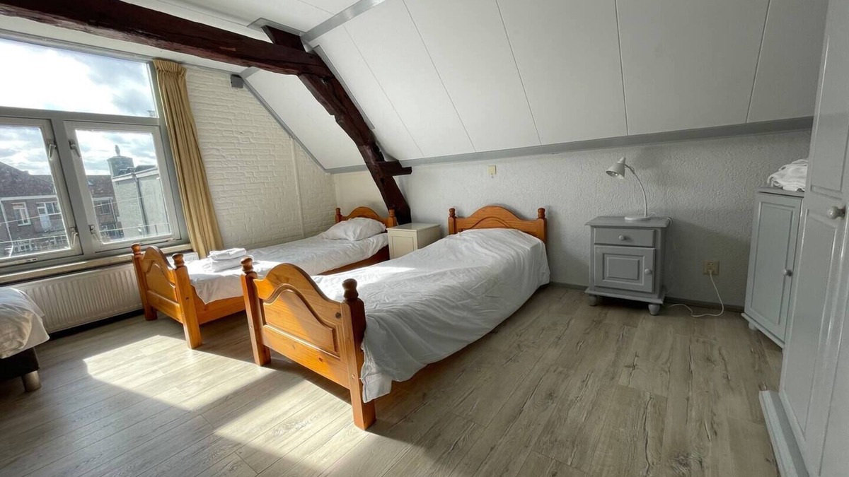 Geertruidenberg Hotel | The spacious living area and three bedrooms provide ample space for your group.