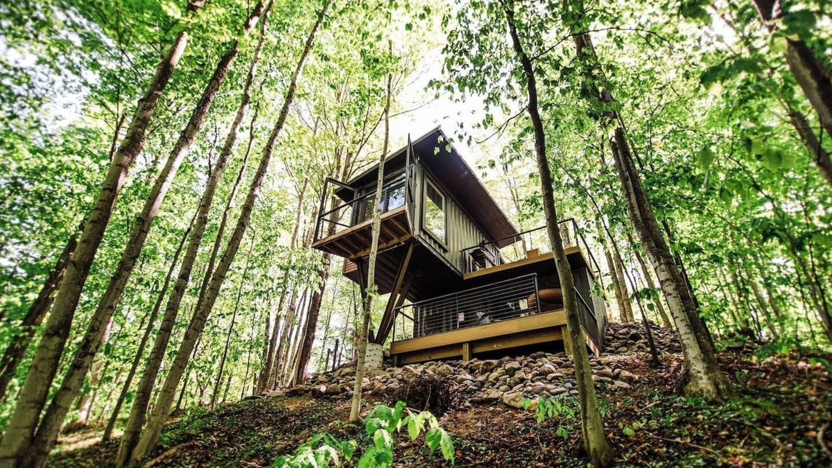 Charlevoix House | The Treehouse escape is set amidst 55 acres of natural beauty
