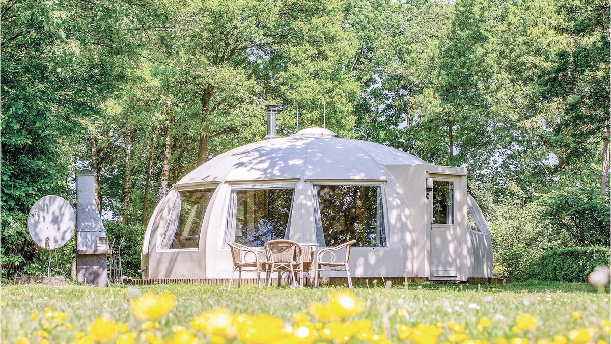 Municipality of Alphen-Chaam House | These detached bungalows with domed roofs are scattered in a wooded resort.