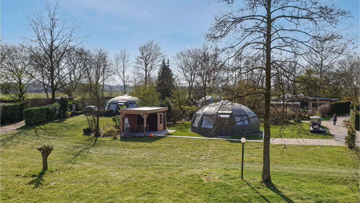 Municipality of Alphen-Chaam House | These detached bungalows with domed roofs are scattered in a wooded resort.