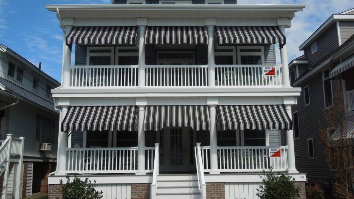 North End Condo | This 5 bedroom, 4 bath 2nd floor unit sleeps 12 and is one block from the beach