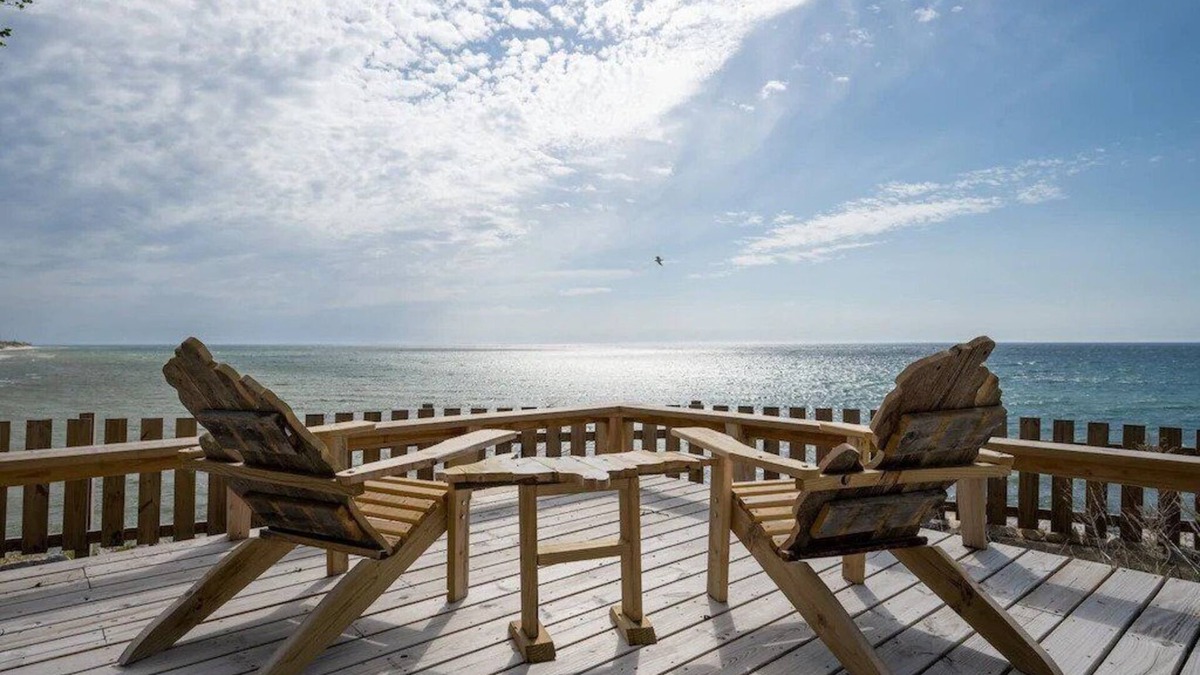 Mears House | This charming vacation home sits directly on Lake Michigan and it delivers!