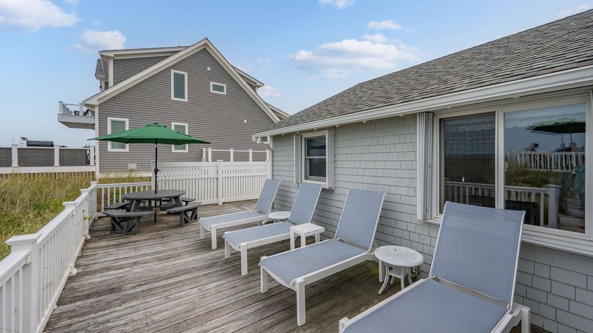 Sagamore Beach House | This enchanting cottage set atop the dunes of Sagamore Beach offers a vacation lifestyle you'll love