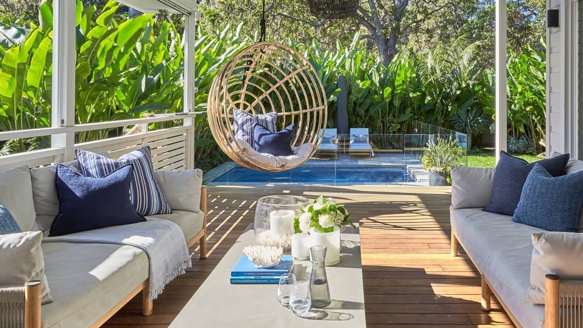 Palm Beach House | This home matches quaint beachside charm with luxurious comfort.