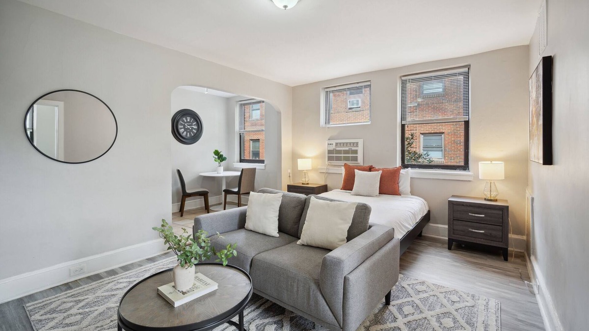 Germantown Apartment | This is a studio apartment with a separate kitchen nook, and a small living nook with a loveseat