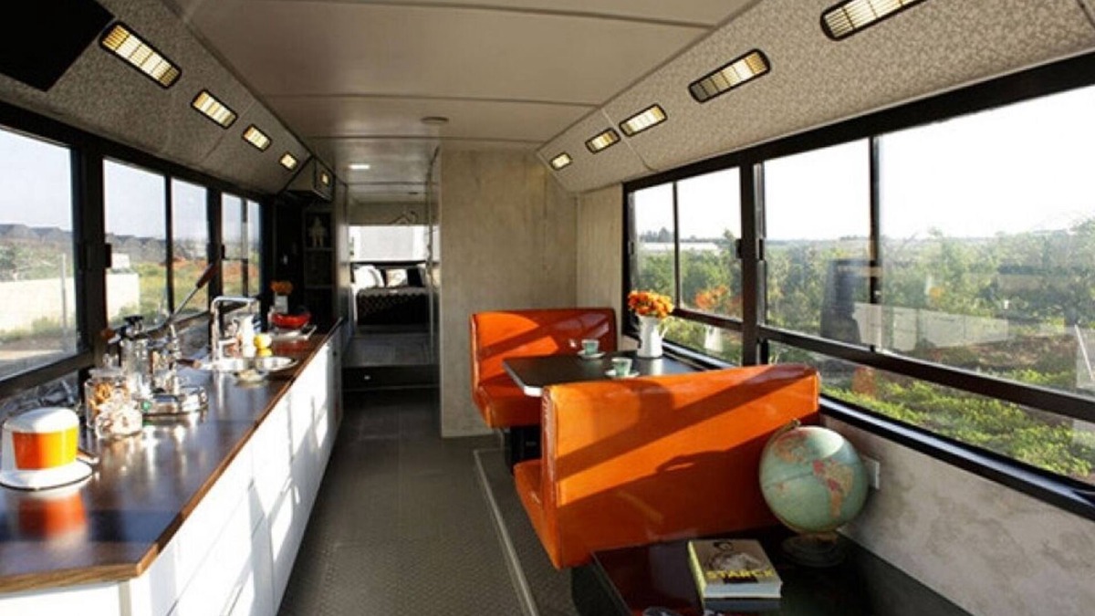 Savyon House | This public bus was converted into a cool and comfortable living space. Located.