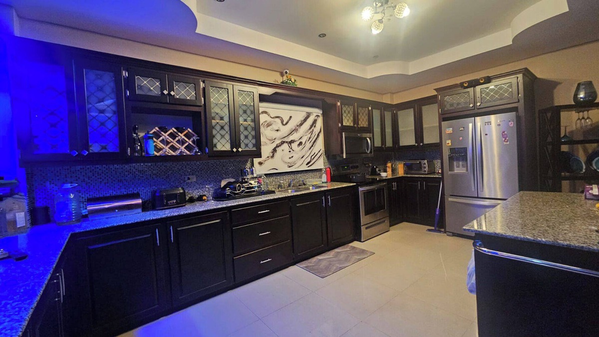 Claxton Bay House | This spacious property features a fully equipped kitchen, and an inviting small pool