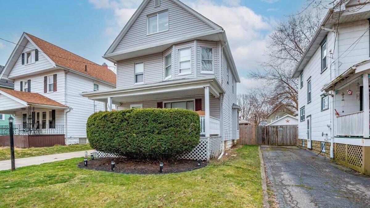 Akron House | This vintage home in Akron provides easy access to nearby cities & attractions.
