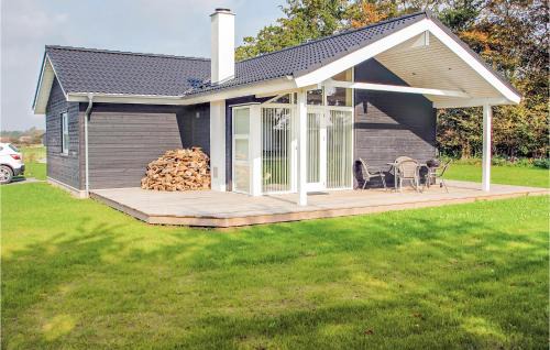 Arø House | Three-Bedroom Holiday Home Haderslev With A Fireplace 01