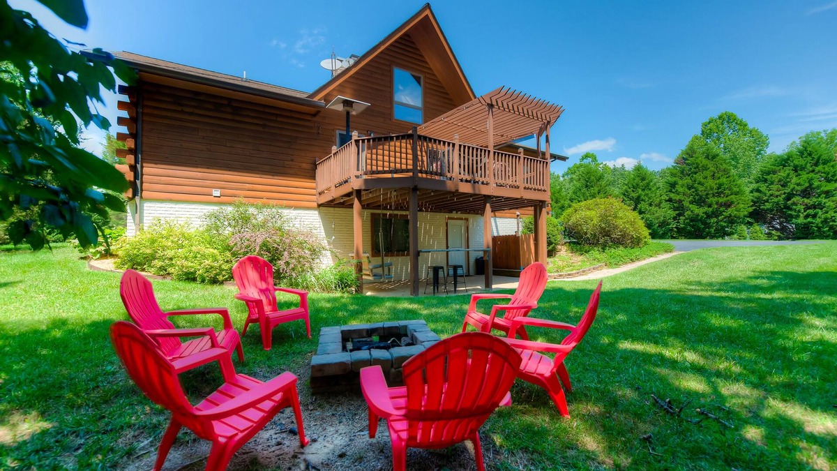 Livingston House | Three-story dog-friendly home with large deck, wood swing, firepit, lawn, & more