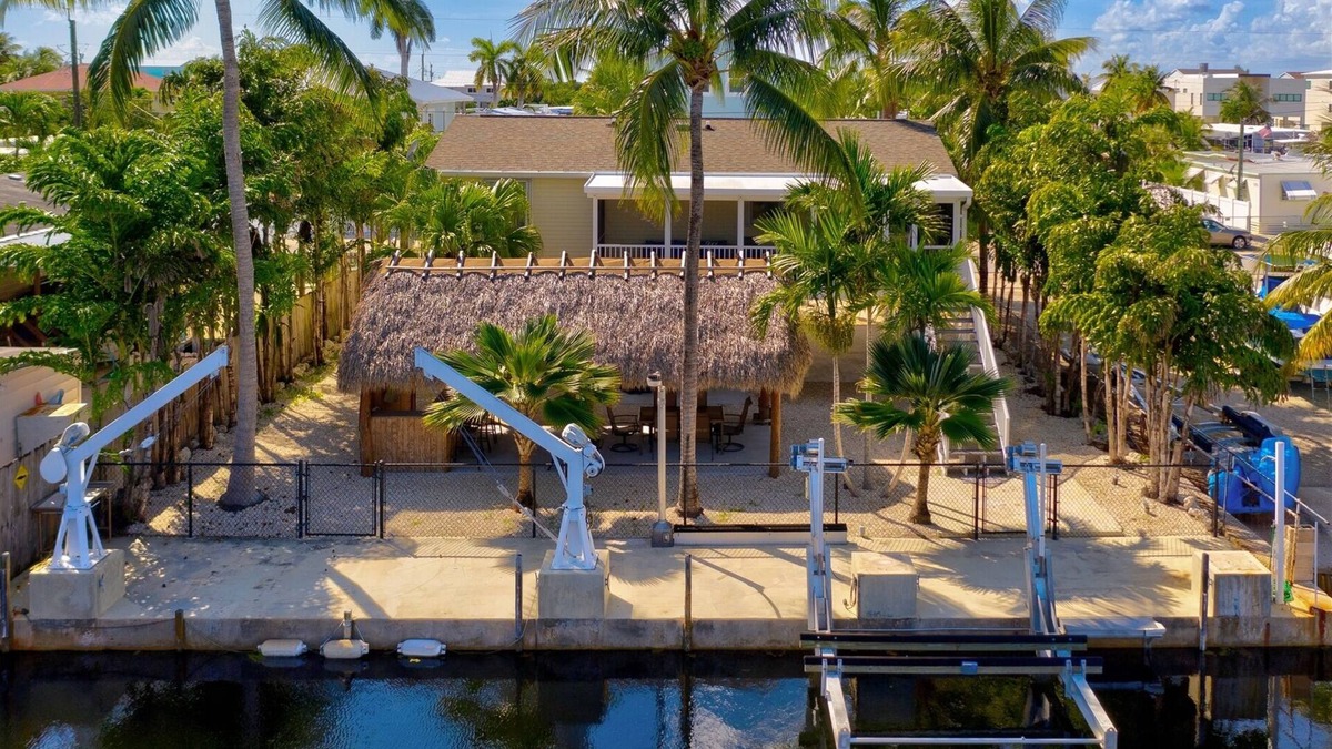 Sexton Cove Estates House | Tiki Time- Canal home with Boat Lift, Key Largo