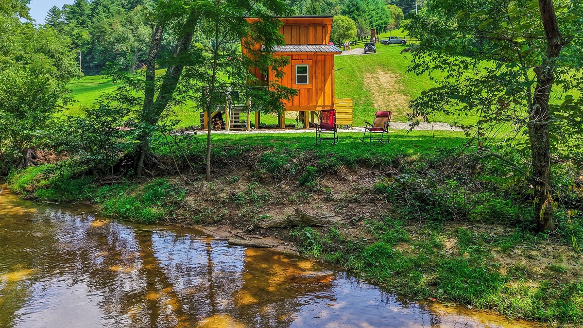 Hillsville Cabin | Tiny cabin sits by a bubbling, stocked creek. Pet friendly, for a fee, hot tub