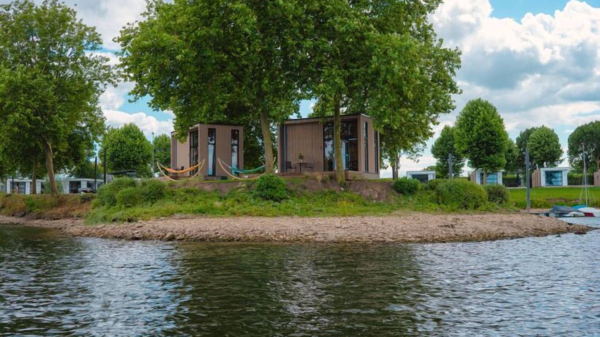 Maurik House | Tiny River House by Interhome