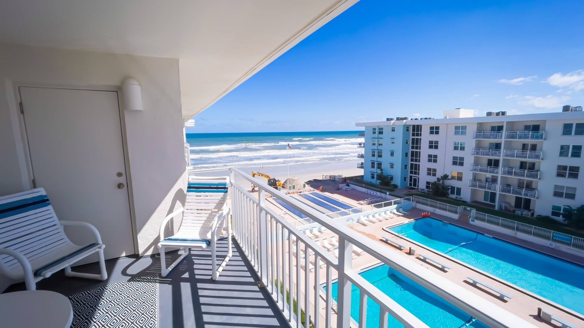 New Smyrna Beach Condo | Top-floor condo with ocean/pool views, private balcony, and heated beachfront pool