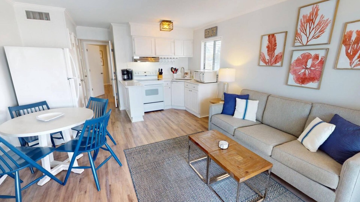 Tybee Island Condo | Top floor condo w. partial ocean + community pool views.