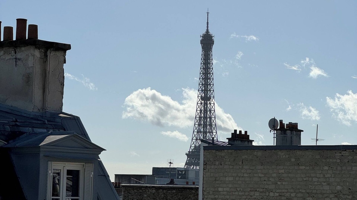 Champs-Elysees Apartment | Top floor Paris studio - view of rooftops and monuments