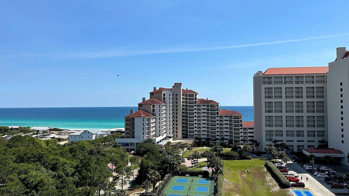 Four Mile Village Condo | Tops'l Summit 913 Great pool, hot tub, close to beach, private resort