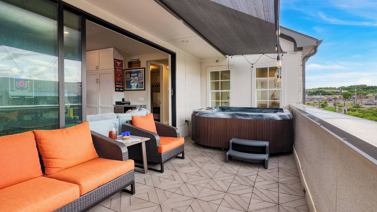 Riverside House | Town Lake Townhouse | Hot Tub, Game Room & Skyline Views