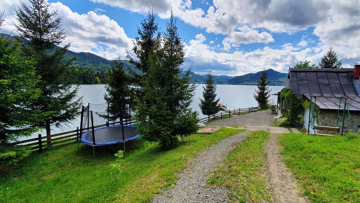 Colibita House | Traditional Fisherman's house Colibita, lakefront with view and pontoon