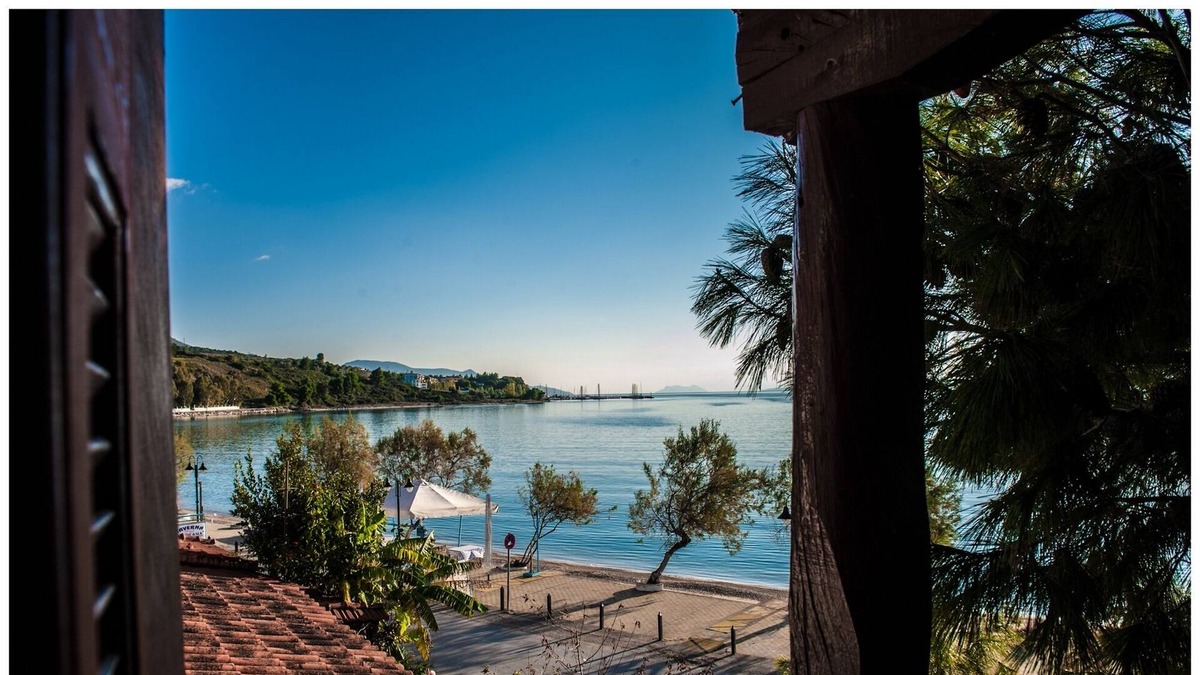 Paleros Villa | Traditional, rustic, seafront villa, just steps away from the beach.