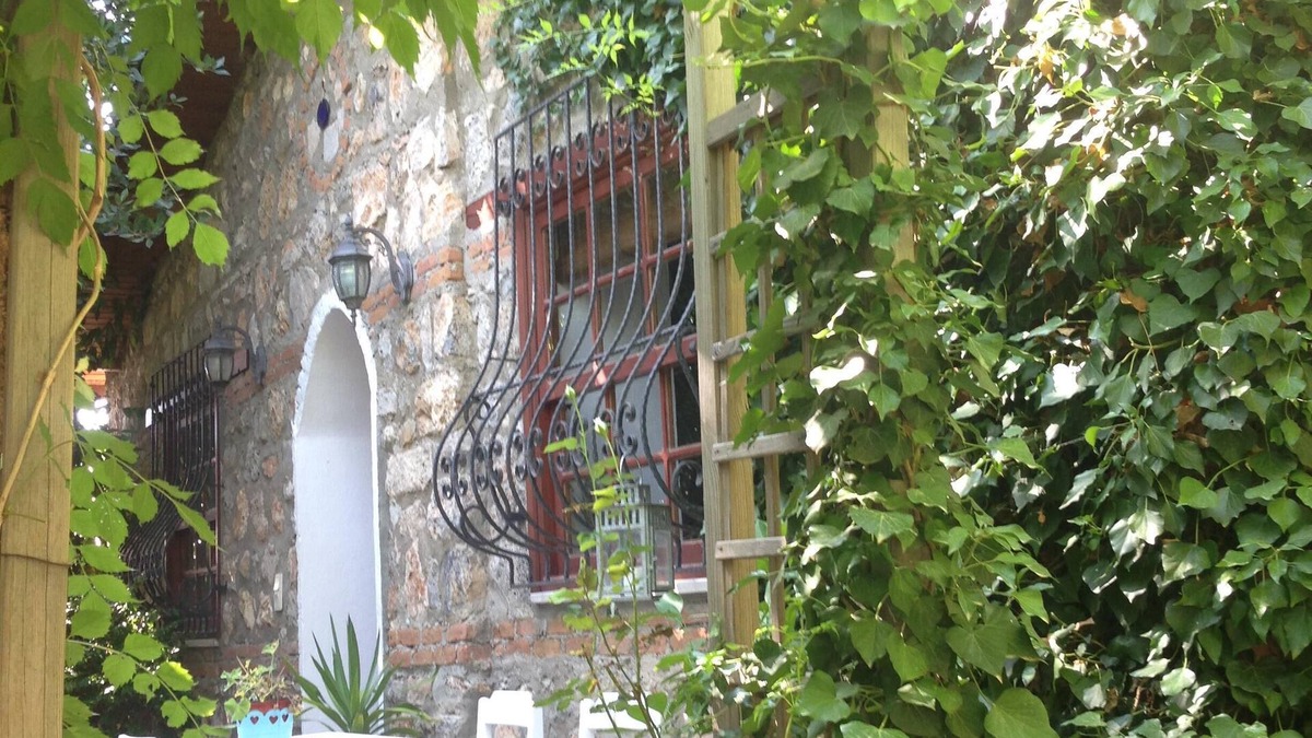 Kayakoy Cottage | Traditional stone cottage with stunning garden in historic Kaya village.