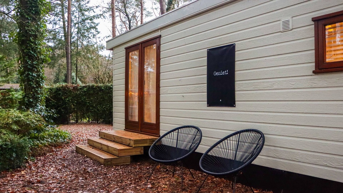 Municipality of Elburg Ski Chalet | Tranquil forest chalet by pond in Veluwe, pet-friendly & sleeps 4