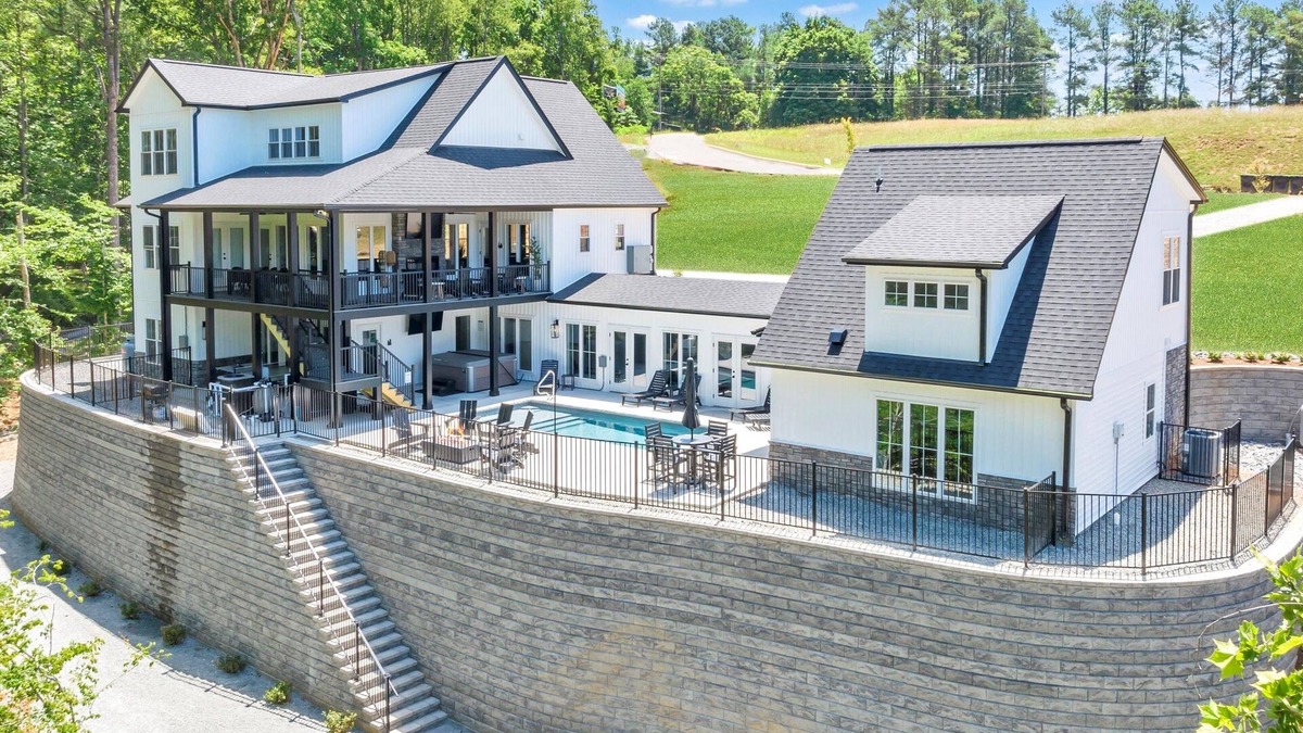 Moneta House | Tranquil Shores Estate, Luxury Lakefront Compound w/Heated Salt Pool, Hot Tub, Dock!
