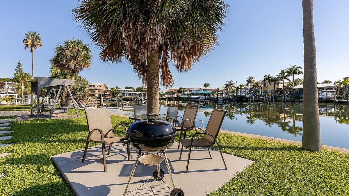 Capri Isle Condo | Treasure Island Waterfront Oasis Minutes to Beach Dock Sunsets at John’s Pass