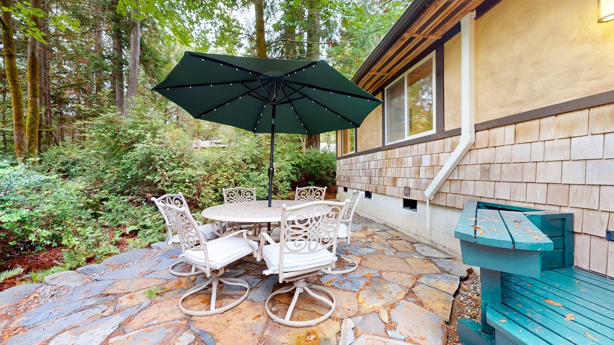 Burley House | Tree-lined retreat with wood fireplace, board game collection, & pool access