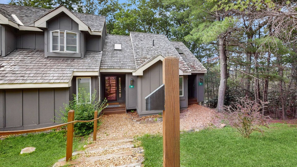 White Haven House | Treetop condo near golf + skiing with deck, grill, fireplace, & washer/dryer