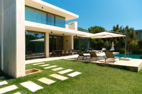 Carvalhal Villa | Troia Design Villa by CadenzaLux