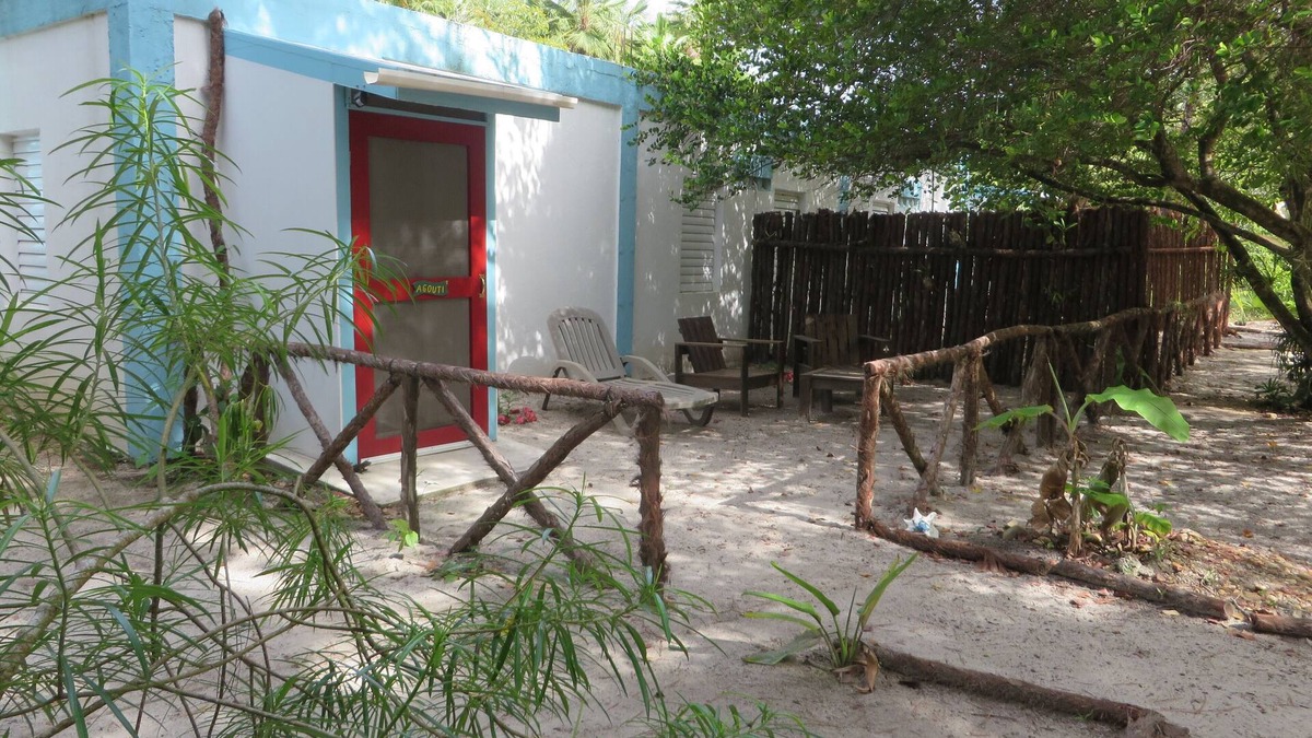 Placencia Apartment | Tropical garden experience in colorful setting in heart of Maya Beach