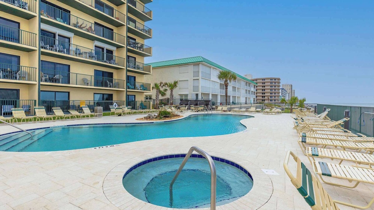 Daytona Beach Shores Apartment | Tropical Palms | Partial Ocean View, Pool, Hot Tub