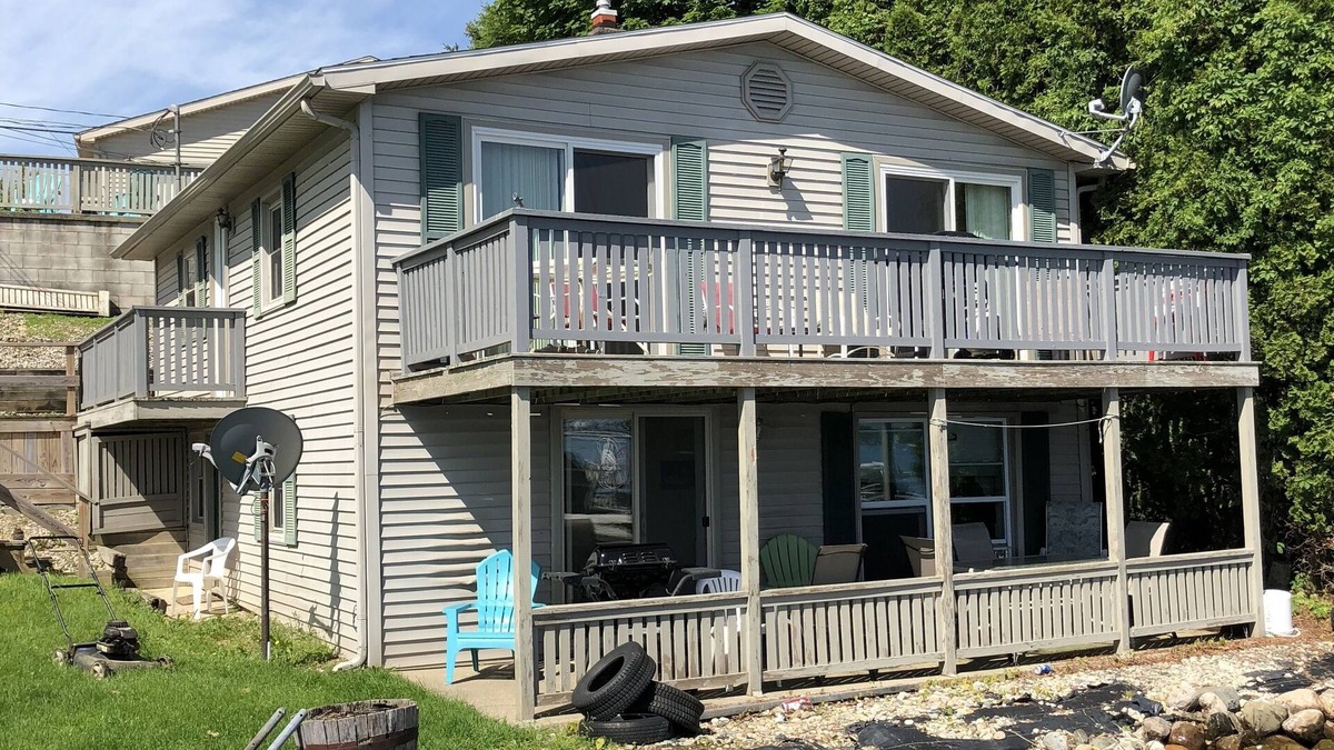 Manitou Beach-Devils Lake Cottage | Two Bed Rooms with a sunrise lakefront view