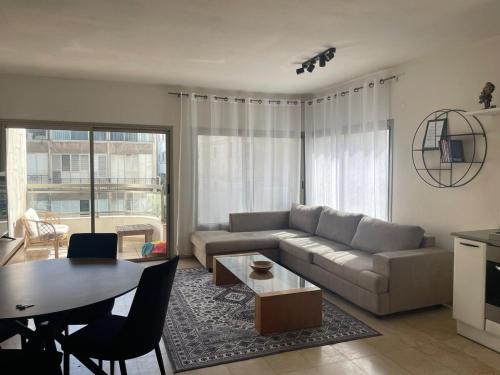 Kerem HaTeimanim Apartment | Two Bedroom Apt l Terrace & Private Parking l On The Beach l by Bookiz