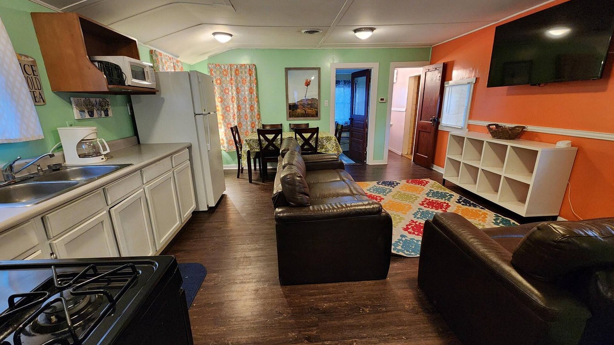 Monticello Cabin | Two Bedroom Cabin - Street & Pool View - Two bedroom cabin conveniently located at Outrigger Resort, right down the road from Indiana Beach Amusement Park! This 600 sq ft classic cabin offers two (2) queen beds and two (2) futons to sleep six (6)! Am