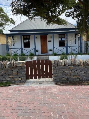 Grange House | Two roomed private suite in front of cottage