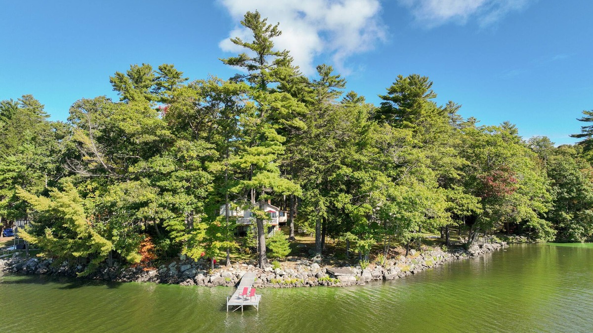 South China House | Two-story lakefront home with a seasonal dock, furnished deck, & washer/dryer